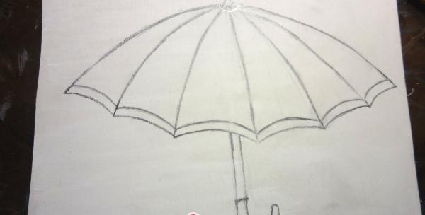 Drawing a sketch of an umbrella