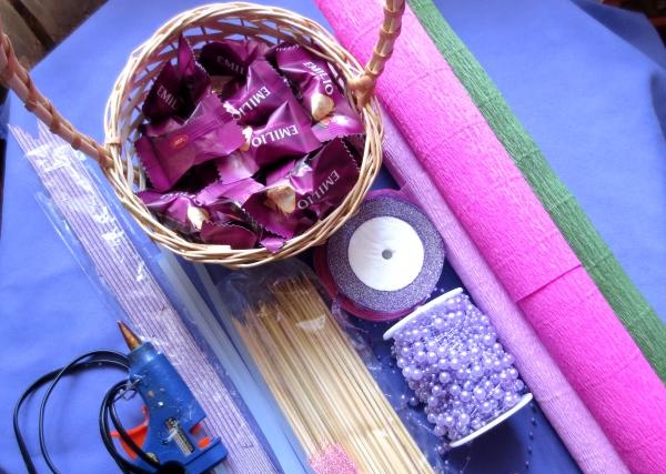 Basket with flowers made from candies