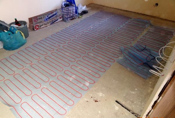 Laying tiles on electric heaters