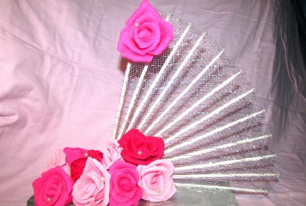 fans with roses made of corrugated paper