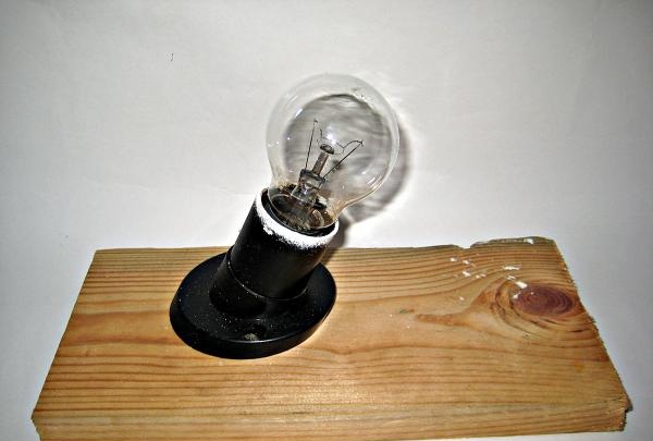 Christmas tree toy made from a light bulb