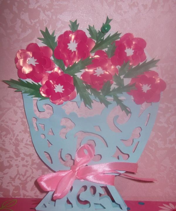 openwork vase with paper flowers