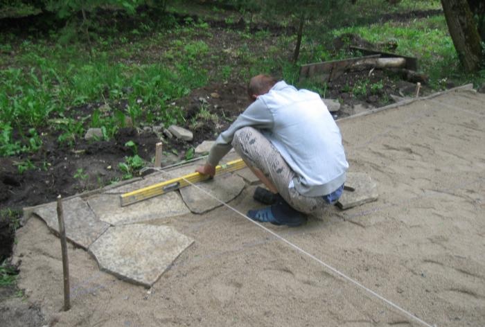 Laying the site with sandstone