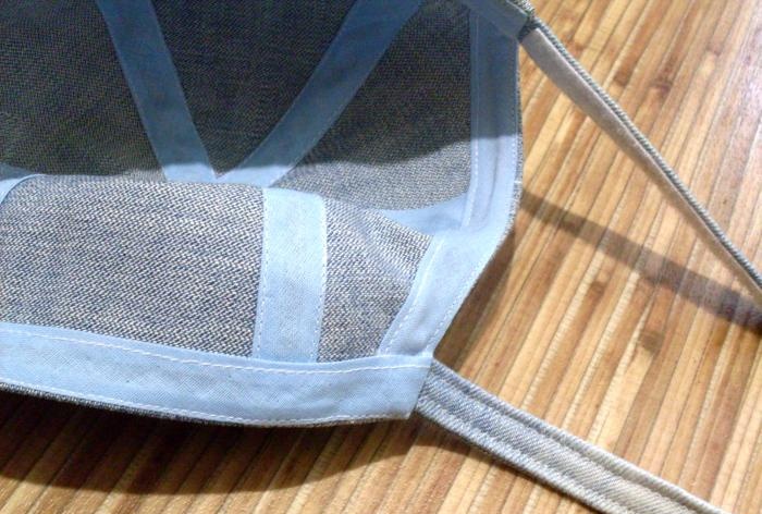 We sew a denim baseball cap for a baby