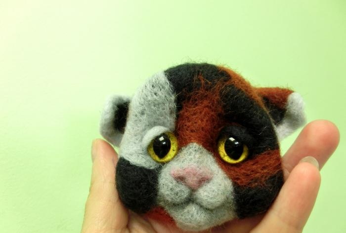 spotted cat made of wool felting