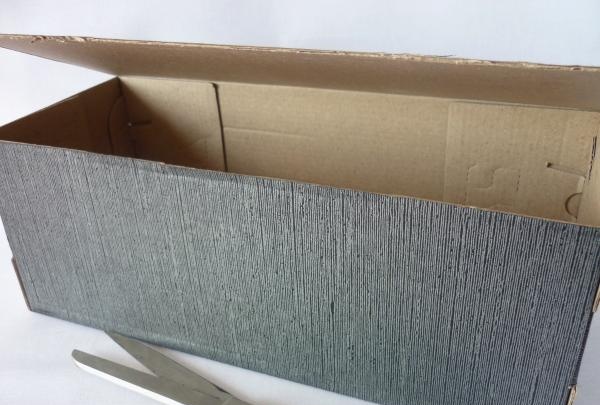 Cut off excess cardboard