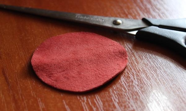 cut a circle out of a piece of leather