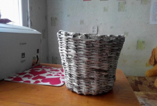 Flower pot made from newspaper tubes