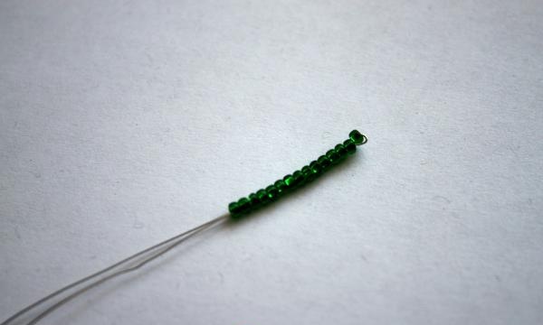 Beaded spruce branch