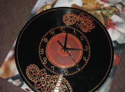 Dot painting of a clock made from a vinyl record.