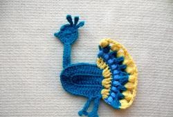 Crochet peacock applique