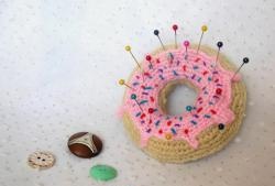 Crochet pincushion in the shape of a donut