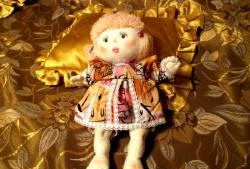 Rag doll with inset eyes