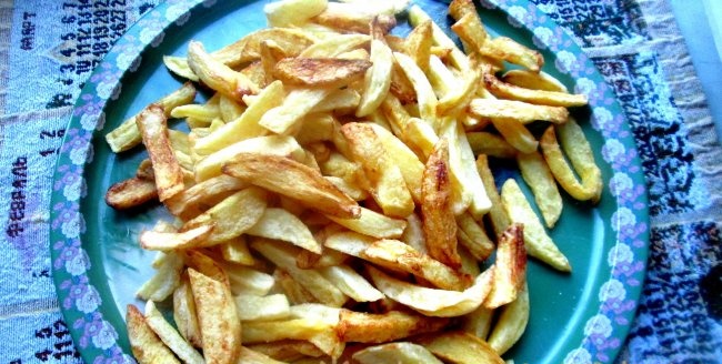 French fries in a paper envelope