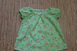 We sew a summer blouse for a baby with our own hands