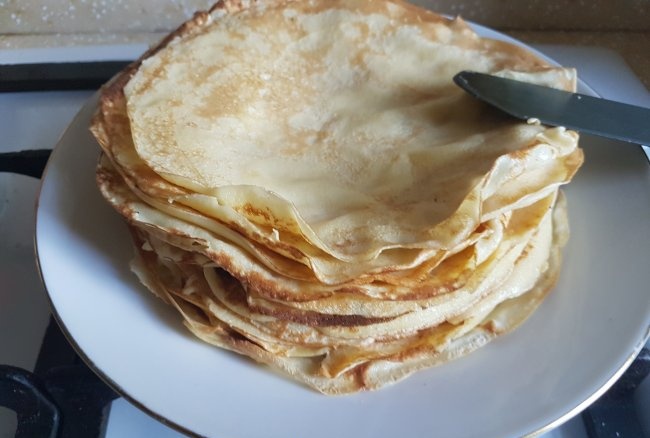 Festive duet pancakes with citrus escort