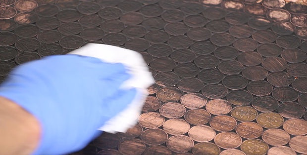 Coin floor under epoxy resin