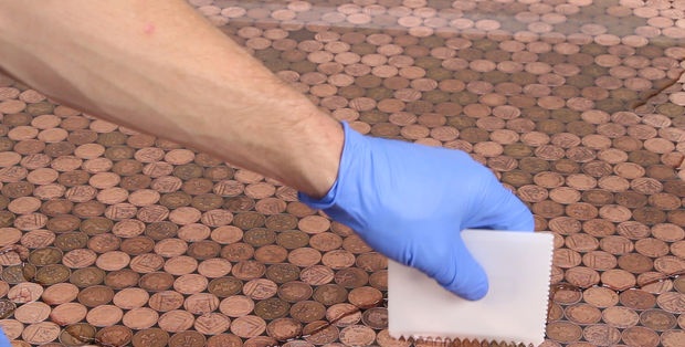 Coin floor under epoxy resin