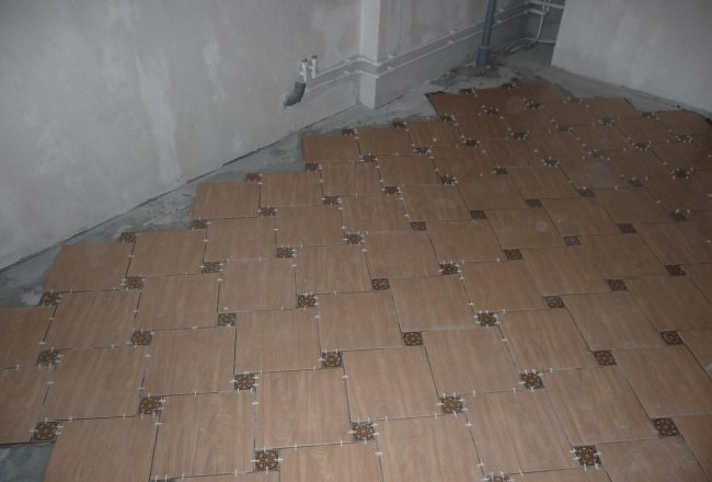 Laying tiles on the floor