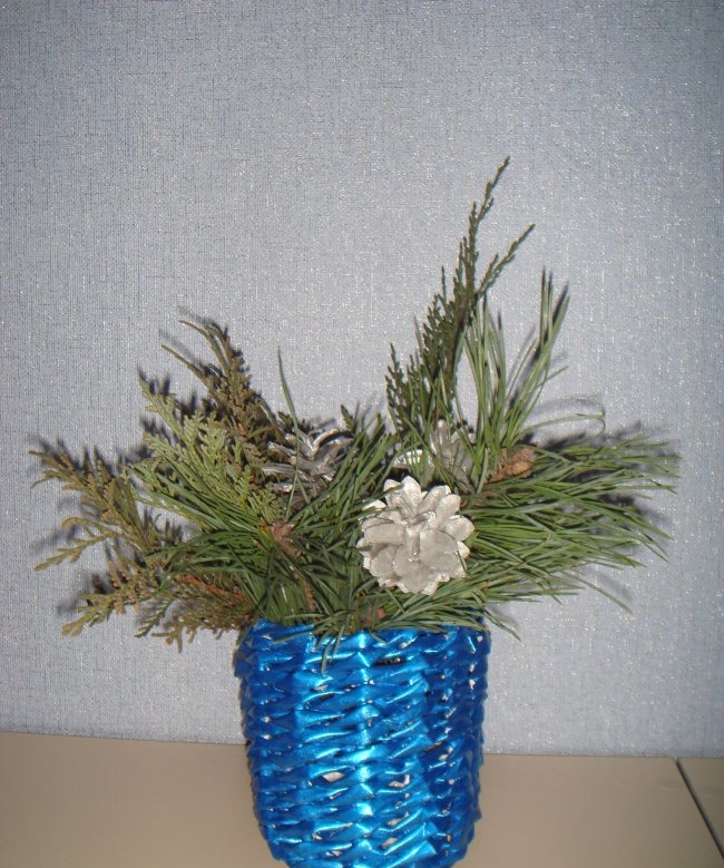 Wicker vase made from newspaper tubes