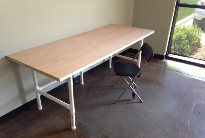 Large table made of plastic pipes