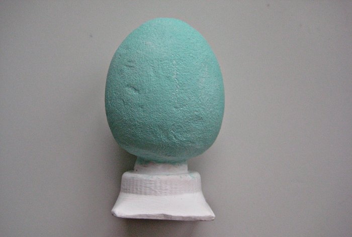 Easter souvenir made of plaster Egg on a stand