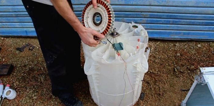 Hydro turbine electric generator from an old washing machine