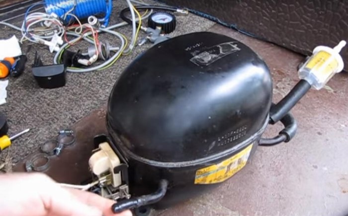 Refrigerator compressor for inflating tires