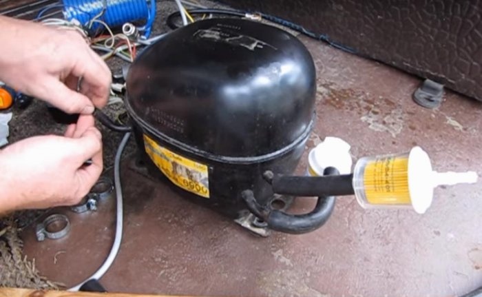 Refrigerator compressor for inflating tires