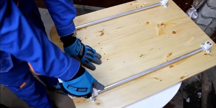 Folding work table made of PVC pipes