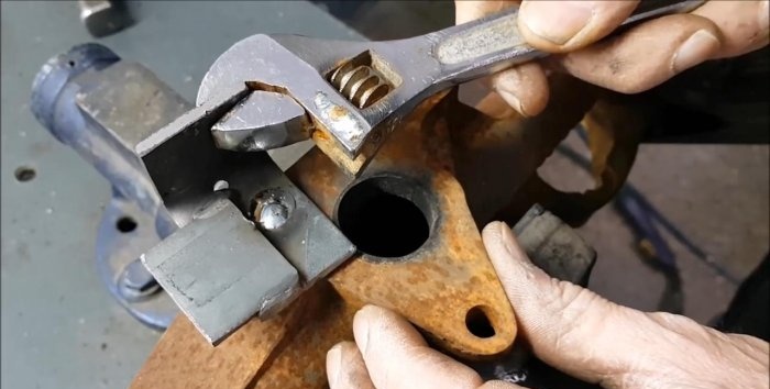 The most effective way to remove a broken stud