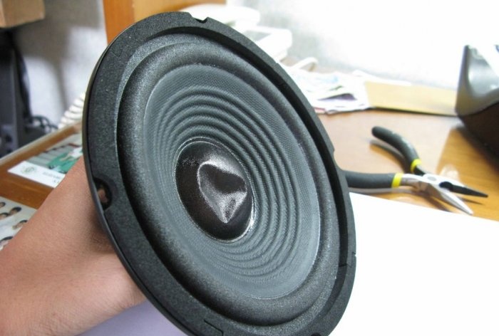 Straightening out dents on the speaker cap