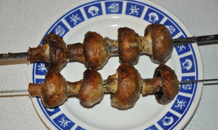 Champignons baked on the grill