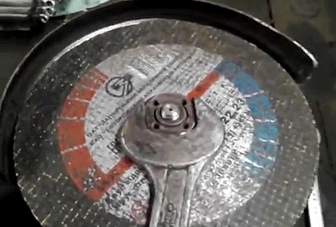 A simple modification to the grinder for easy unscrewing of the nut