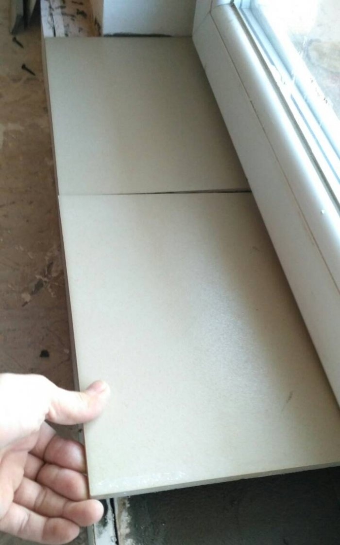 Installation of tiles on the balcony threshold