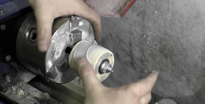 Grinder from a washing machine engine