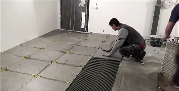 High-speed tile laying using a super comb