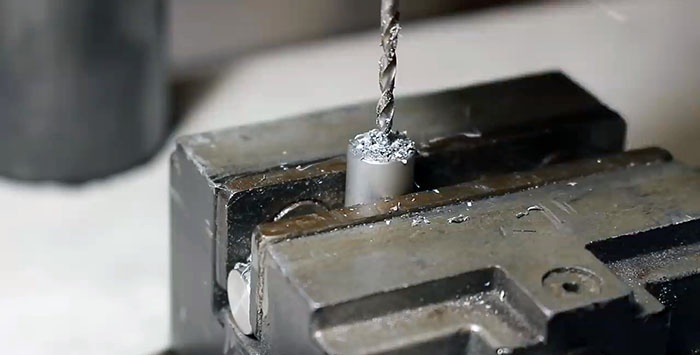 How to accurately drill a side hole in a round workpiece