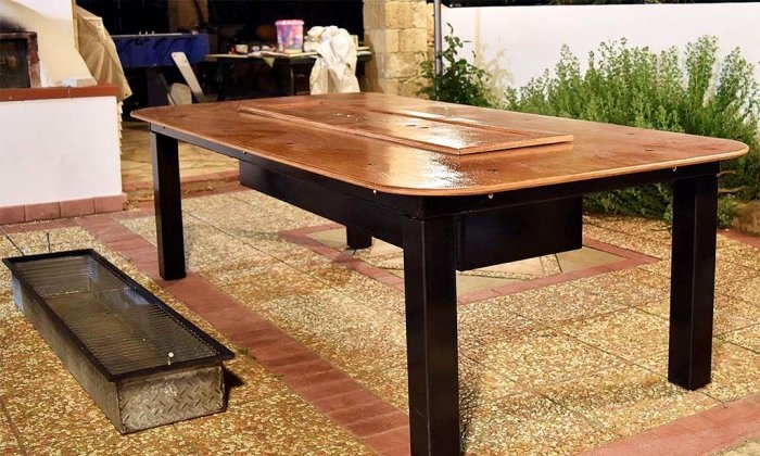 Homemade table with built-in barbecue