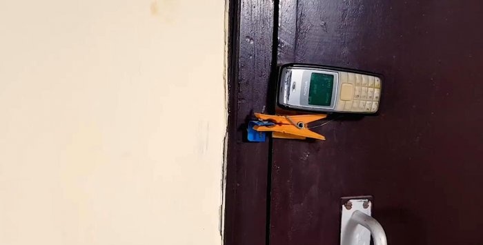 The simplest GSM alarm from an old phone