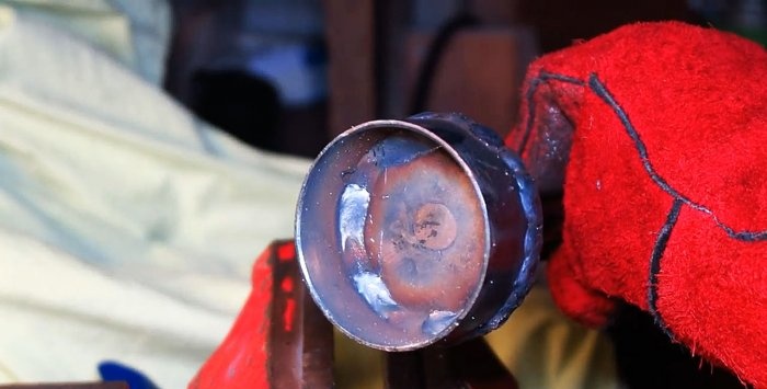 Hammers wooden stakes with a hammer drill