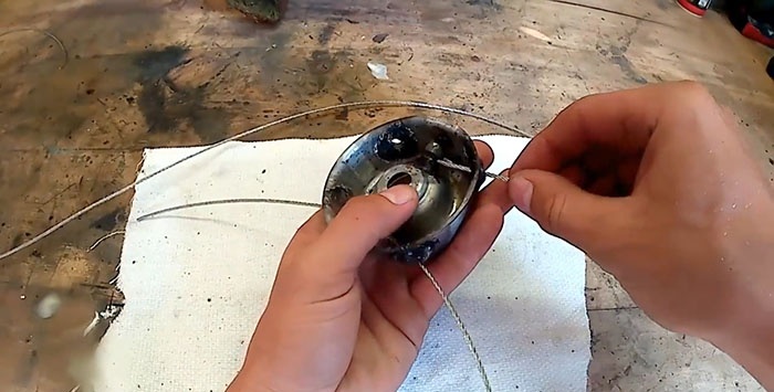 How to replace fishing line in a trimmer with steel cable