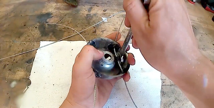 How to replace fishing line in a trimmer with steel cable