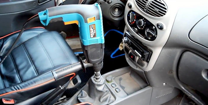 A hammer drill is an indispensable assistant in car repair.