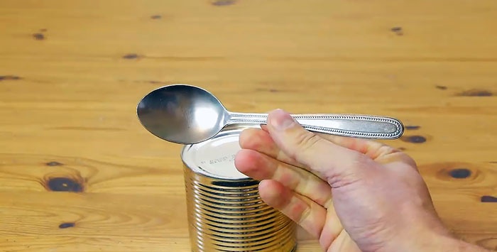 How to open a tin can with a spoon