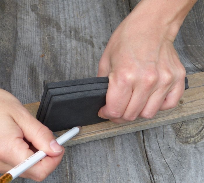 A homemade brush made from recycled materials that doesn't allow debris to stick to it.