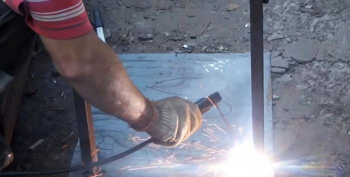 A simple stand for an angle grinder made from a bicycle