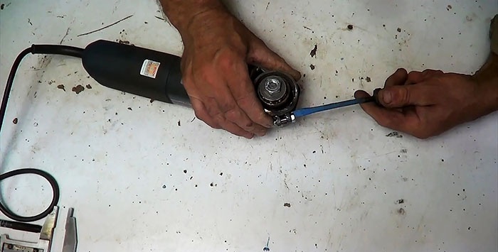 Do-it-yourself electric hacksaw from a grinder