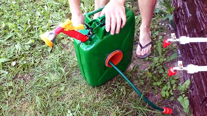 DIY case for a watering hose from an old canister