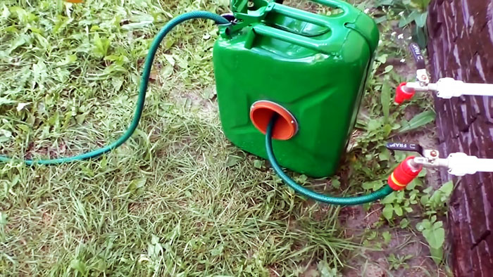 DIY case for a watering hose from an old canister